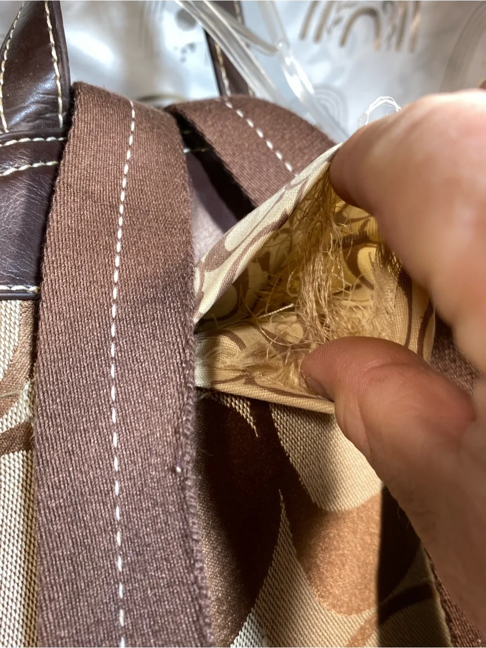 C Brown and Tan Signature Canvas Backpack